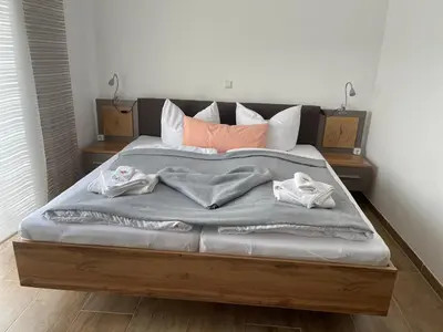 Ein Bett oder Betten in einem Zimmer der Unterkunft Die 1A Pension