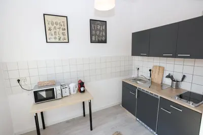 Küche/Küchenzeile in der Unterkunft FullHouse - Chemnitz - M45 Apartments