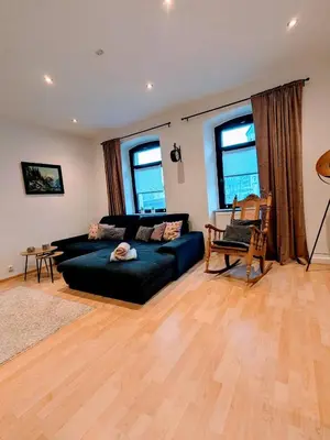 Ein Sitzbereich in der Unterkunft Ferienwohnung am Rabenauer Grund