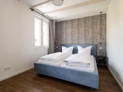 Ein Bett oder Betten in einem Zimmer der Unterkunft Neues Ferienhaus
