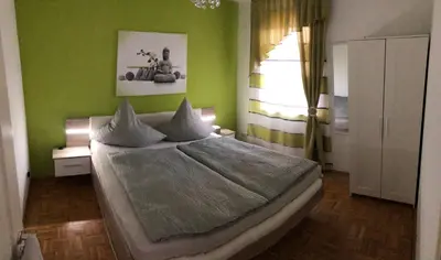 Ein Bett oder Betten in einem Zimmer der Unterkunft Apartment Altstadt 2