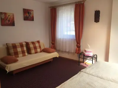 Ein Bett oder Betten in einem Zimmer der Unterkunft Ferienwohnung Lilienstein