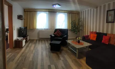 Ein Sitzbereich in der Unterkunft Ferienwohnung Lilienstein