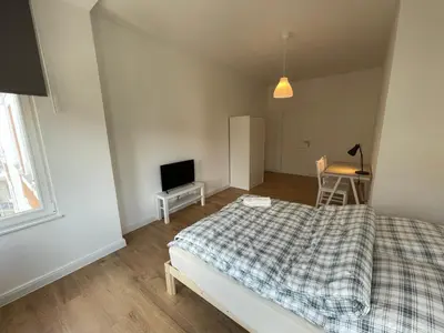 Ein Bett oder Betten in einem Zimmer der Unterkunft Pension Luisengrün