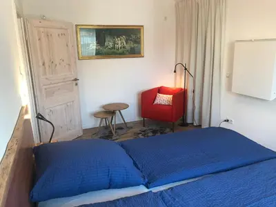 Ein Bett oder Betten in einem Zimmer der Unterkunft Alte Post Altwahnsdorf