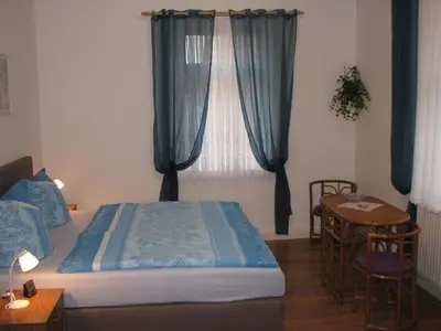 Ein Bett oder Betten in einem Zimmer der Unterkunft Ferienwohnung Zirkelstein