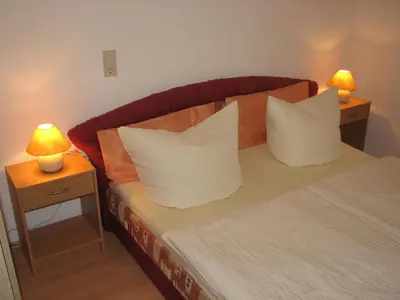 Ein Bett oder Betten in einem Zimmer der Unterkunft Ferienwohnung Zirkelstein