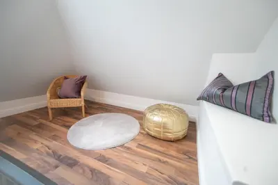 Ein Sitzbereich in der Unterkunft Privatsphäre im Kutscherhaus der Villa Golding
