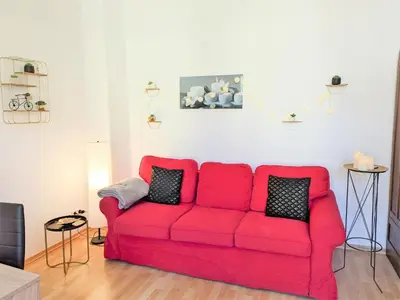 Ein Sitzbereich in der Unterkunft UO - Urlaubsmagie - helle Wohnung, Saunazugang