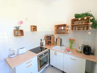 Küche/Küchenzeile in der Unterkunft UO - Urlaubsmagie - helle Wohnung, Saunazugang