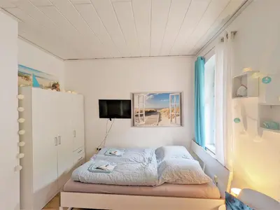 Ein Bett oder Betten in einem Zimmer der Unterkunft H1 - Urlaubsmagie - Pool & Terrasse zum Entspannen