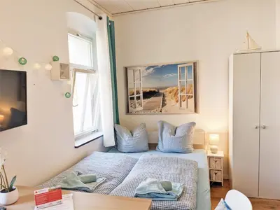 Ein Bett oder Betten in einem Zimmer der Unterkunft H2 - Urlaubsmagie - Garten, Pool, Terrasse, Grill