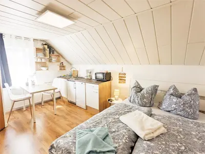 Ein Bett oder Betten in einem Zimmer der Unterkunft H5 - Urlaubsmagie - Wohlfühloase mit Pool