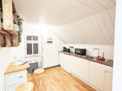 Küche/Küchenzeile in der Unterkunft H6 -Urlaubsmagie- Wohnung für 3 mit Pool & Terrasse