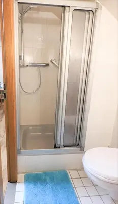 Ein Badezimmer in der Unterkunft H6 -Urlaubsmagie- Wohnung für 3 mit Pool & Terrasse