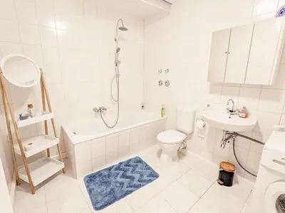 Ein Badezimmer in der Unterkunft W5 - Urlaubsmagie - Wohnung mit Grill, Terrasse & Pool