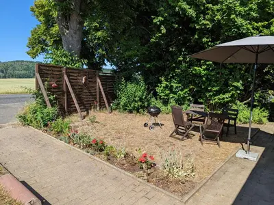 Ein Garten an der Unterkunft W5 - Urlaubsmagie - Wohnung mit Grill, Terrasse & Pool