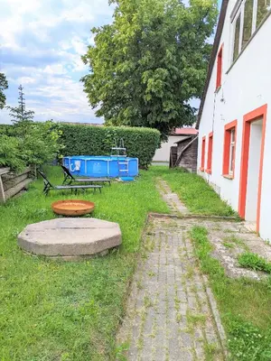 Ein Garten an der Unterkunft W5 - Urlaubsmagie - Wohnung mit Grill, Terrasse & Pool