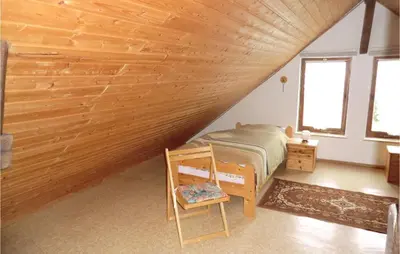 Ein Bett oder Betten in einem Zimmer der Unterkunft Ferienhaus Stolpen, Ot Lauterbach Am Sportplatz
