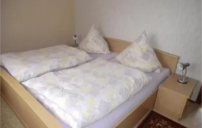 Ein Bett oder Betten in einem Zimmer der Unterkunft Ferienhaus Stolpen, Ot Lauterbach Am Sportplatz