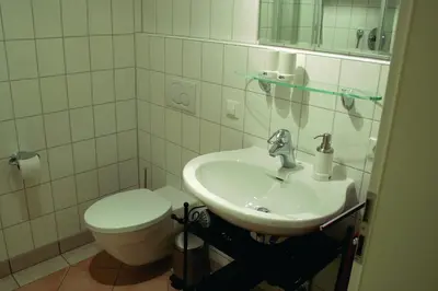 Ein Badezimmer in der Unterkunft Apartments Obergraben