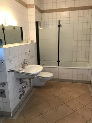 Ein Badezimmer in der Unterkunft Apartments Obergraben