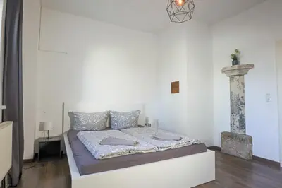 Ein Bett oder Betten in einem Zimmer der Unterkunft Gewölbe aus dem Jahr 1806 genau zw L und DD