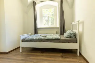 Ein Bett oder Betten in einem Zimmer der Unterkunft Gewölbe aus dem Jahr 1806 genau zw L und DD