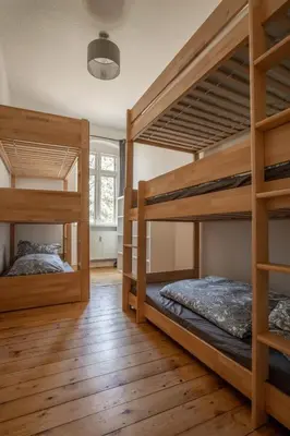 Ein Bett oder Betten in einem Zimmer der Unterkunft Zeitreise: Wohnen im Herrenhaus genau zw. L u. DD