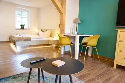 Ein Bett oder Betten in einem Zimmer der Unterkunft Altstadt-Domizil