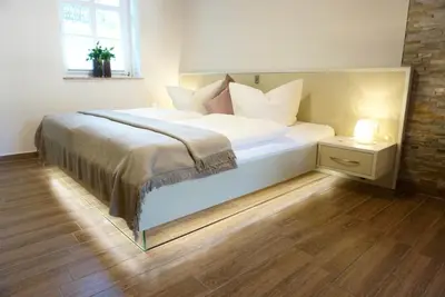 Ein Bett oder Betten in einem Zimmer der Unterkunft Altstadt-Domizil