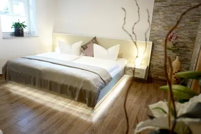 Ein Bett oder Betten in einem Zimmer der Unterkunft Altstadt-Domizil