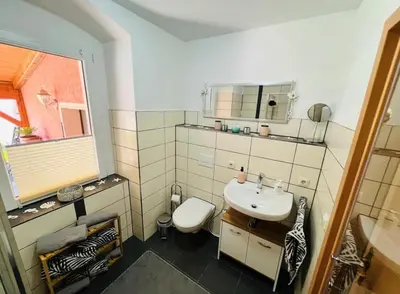 Ein Badezimmer in der Unterkunft Gemütliche Wohnung in Grünhainichen Erzgebirge