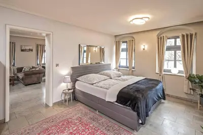 Ein Bett oder Betten in einem Zimmer der Unterkunft Cosel Palais Appartement