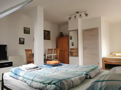 Ein Bett oder Betten in einem Zimmer der Unterkunft Schmetterling Zimmer