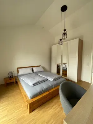 Ein Bett oder Betten in einem Zimmer der Unterkunft BNB Klinga