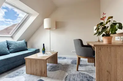 Ein Sitzbereich in der Unterkunft Hotel & Restaurant Rödersaal