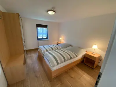 Ein Bett oder Betten in einem Zimmer der Unterkunft Ferienwohnung Pintaske