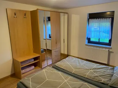 Ein Bett oder Betten in einem Zimmer der Unterkunft Ferienwohnung Pintaske