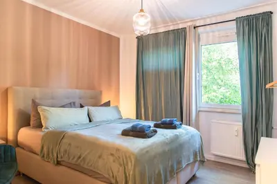 Ein Bett oder Betten in einem Zimmer der Unterkunft Smart & Cozy Apartment - Balkon, Netflix, Nespresso