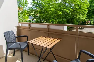 Ein Balkon oder eine Terrasse in der Unterkunft Smart & Cozy Apartment - Balkon, Netflix, Nespresso