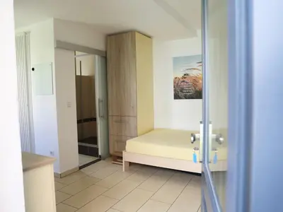 Ein Bett oder Betten in einem Zimmer der Unterkunft Ferienwohnungen Prihoda