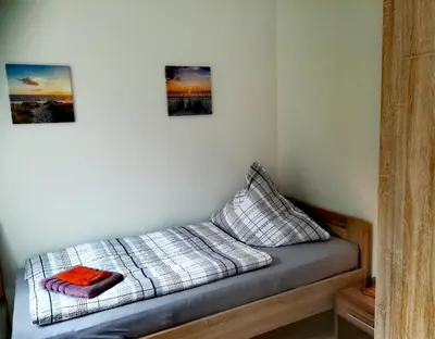 Ein Bett oder Betten in einem Zimmer der Unterkunft Ferienwohnung Karsten - nahe Chemnitz