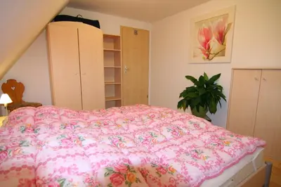 Ein Bett oder Betten in einem Zimmer der Unterkunft Ferienhaus Auerswalde