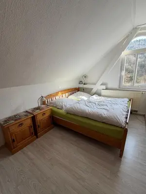 Ein Bett oder Betten in einem Zimmer der Unterkunft Im Herzen des Elbsandsteingebirges