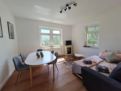 Ein Sitzbereich in der Unterkunft Bergapartment