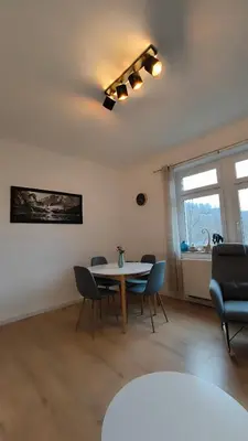 Ein Sitzbereich in der Unterkunft Bergapartment