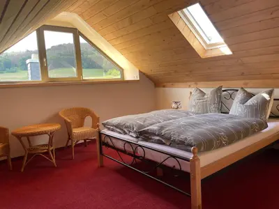 Ein Bett oder Betten in einem Zimmer der Unterkunft Ferienwohnung-Ferienhaus am Picho