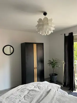 Ein Bett oder Betten in einem Zimmer der Unterkunft City Apartment #2 bei der Porzellan Manufaktur