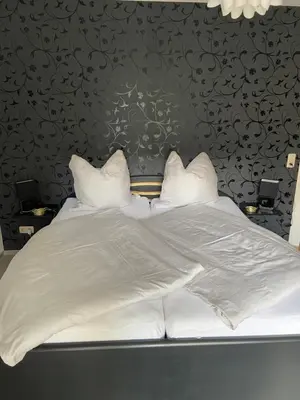 Ein Bett oder Betten in einem Zimmer der Unterkunft City Apartment #2 bei der Porzellan Manufaktur